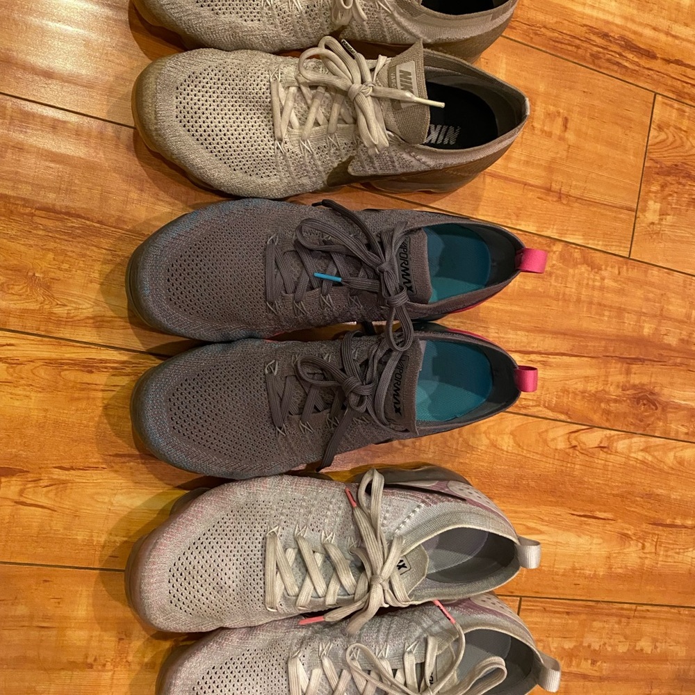 3 pairs of Nike running shoes